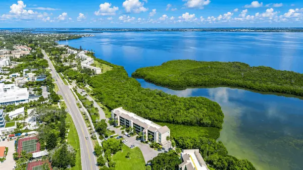 Windward Bay: Bayfront Living with Sweeping Water Views,Hunt Brothers Realty