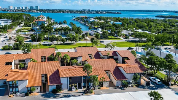 Embassy Villas: A Private Lido Key Retreat Near the Gulf,Hunt Brothers Realty