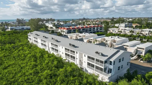 Sandy Pointe Condos: Island Living Close to Beach, Shops and Dining