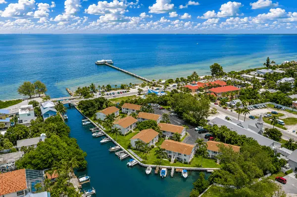 Coconut Bayou: Coastal Homes Near Pine Avenue and the Bay,Hunt Brothers Realty