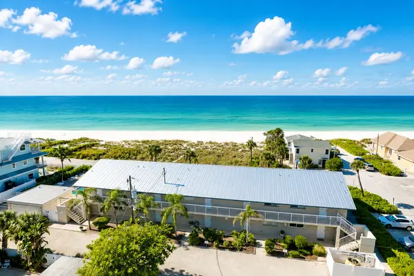 Island Beach Club Condos: Beachfront Living in the Heart of Holmes Beach,Hunt Brothers Realty