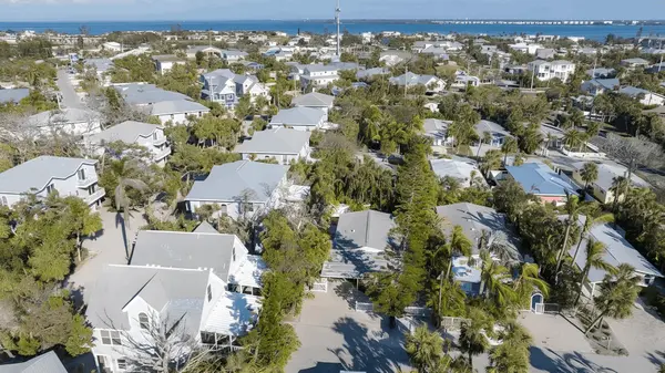 Neptunes Gardens: Coastal Living with Classic Anna Maria Island Appeal,Hunt Brothers Realty