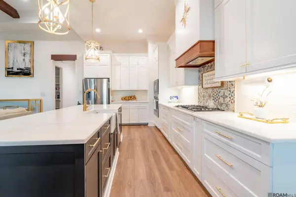 406 Last Quarter Drive, Youngsville, LA 70592