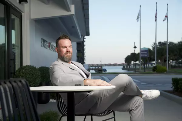 Rob sitting in front of EV