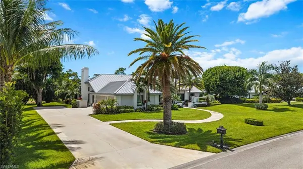 13029 Bald Cypress LN, Naples, FL 34119
