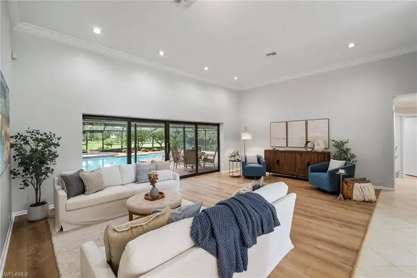 13029 Bald Cypress LN, Naples, FL 34119