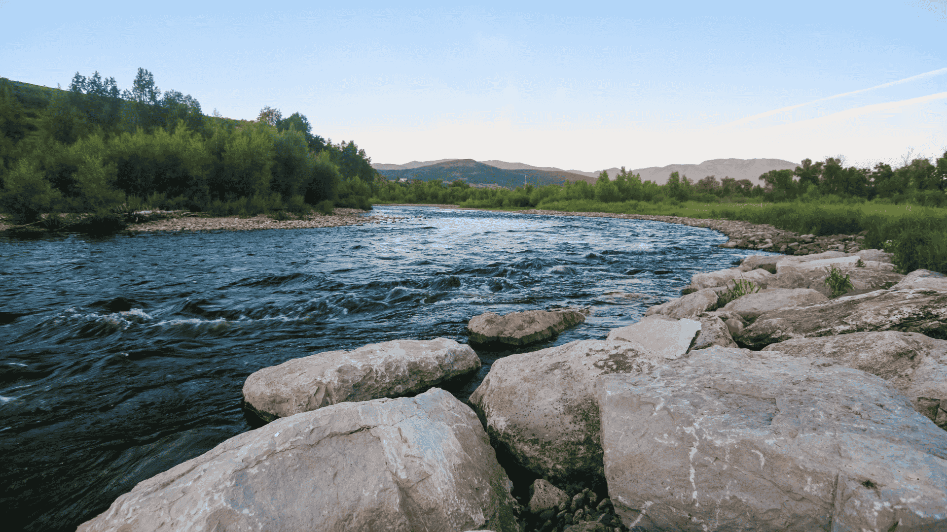Colorado mountain stream showing surface water resources for land buyers