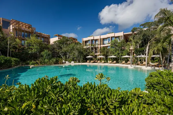 Resort-style swimming pool within the Aflora Tulum residential community