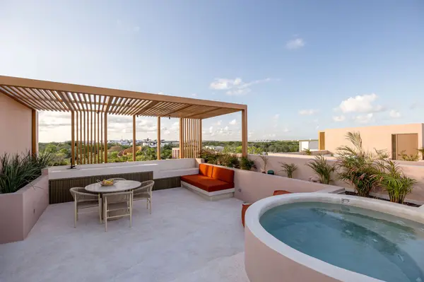 Private rooftop pool surrounded by jungle at Aflora Tulum luxury residences