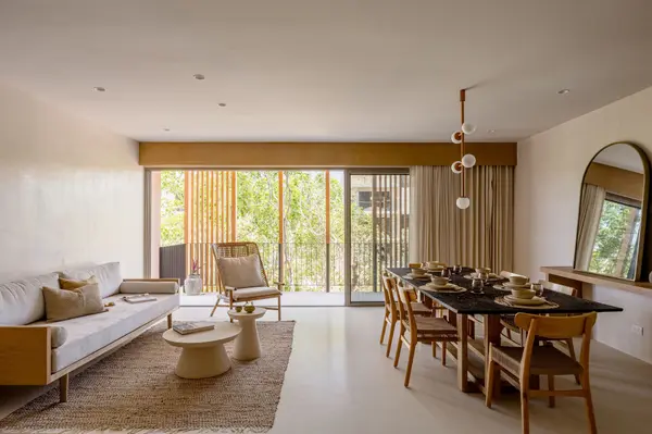 Open-concept living room designed for relaxed tropical living at Aflora Tulum