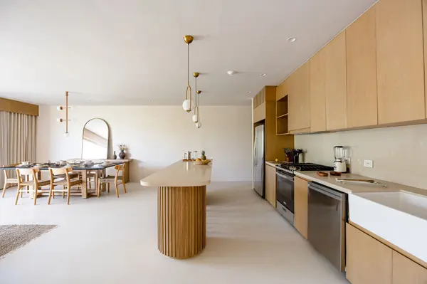 Modern kitchen with natural finishes at Aflora Tulum luxury residences