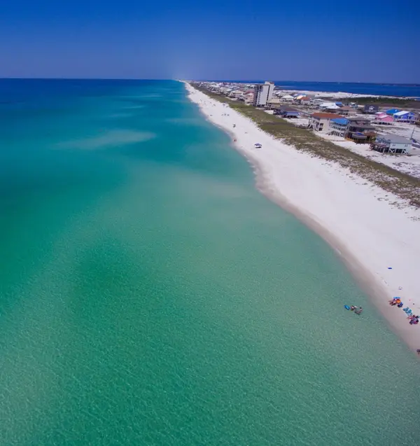 feature image of Coastal Living in Pensacola: What to Know Before You Buy Near the Water