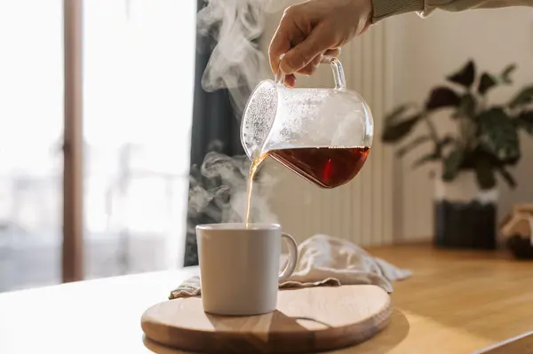 Canva - Real Estate Editorial Indoor Pouring Coffee Into Cup