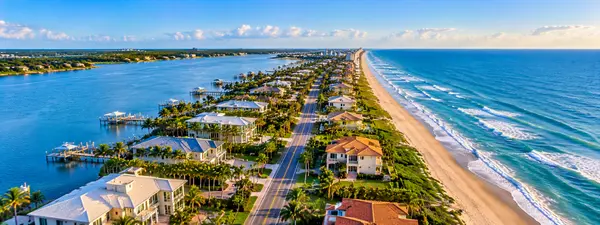 Aerial Coastal Town and Oceanfront Canal