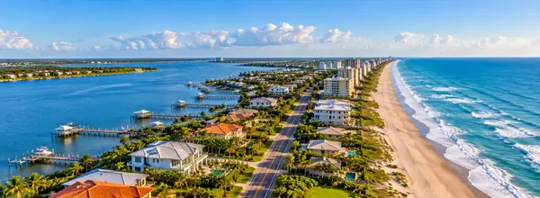 Aerial Coastal City and Lagoon Panorama