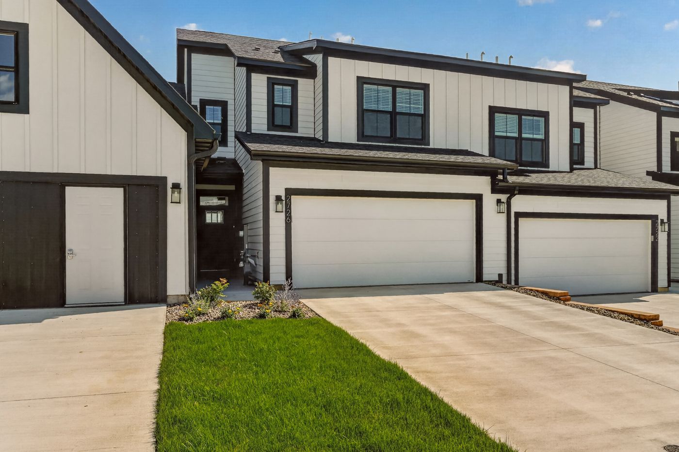 Uptown townhomes on Bentgrass Rd NW at Prairie Ridge