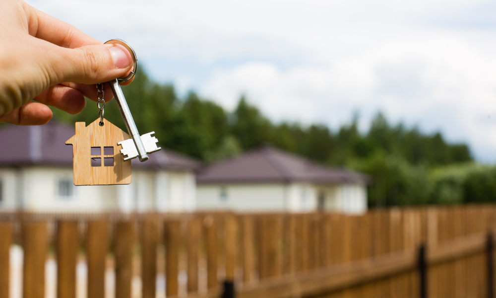 Homeowner holding new keys to property