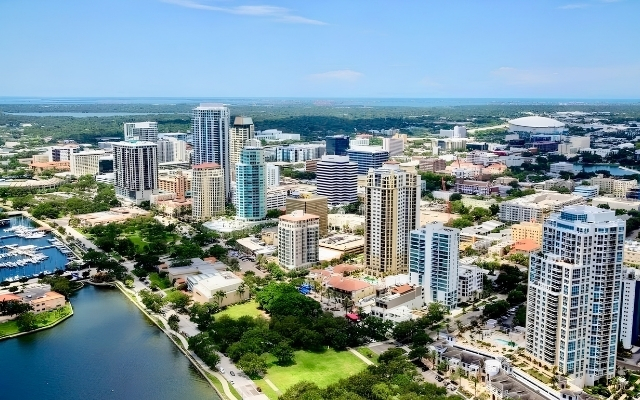 Aerial view of downtown St. Petersburg, FL condo buildings near water