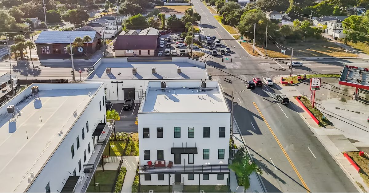Aerial view of new construction and mixed-use buildings near a St. Petersburg, FL intersection in the Warehouse Arts District