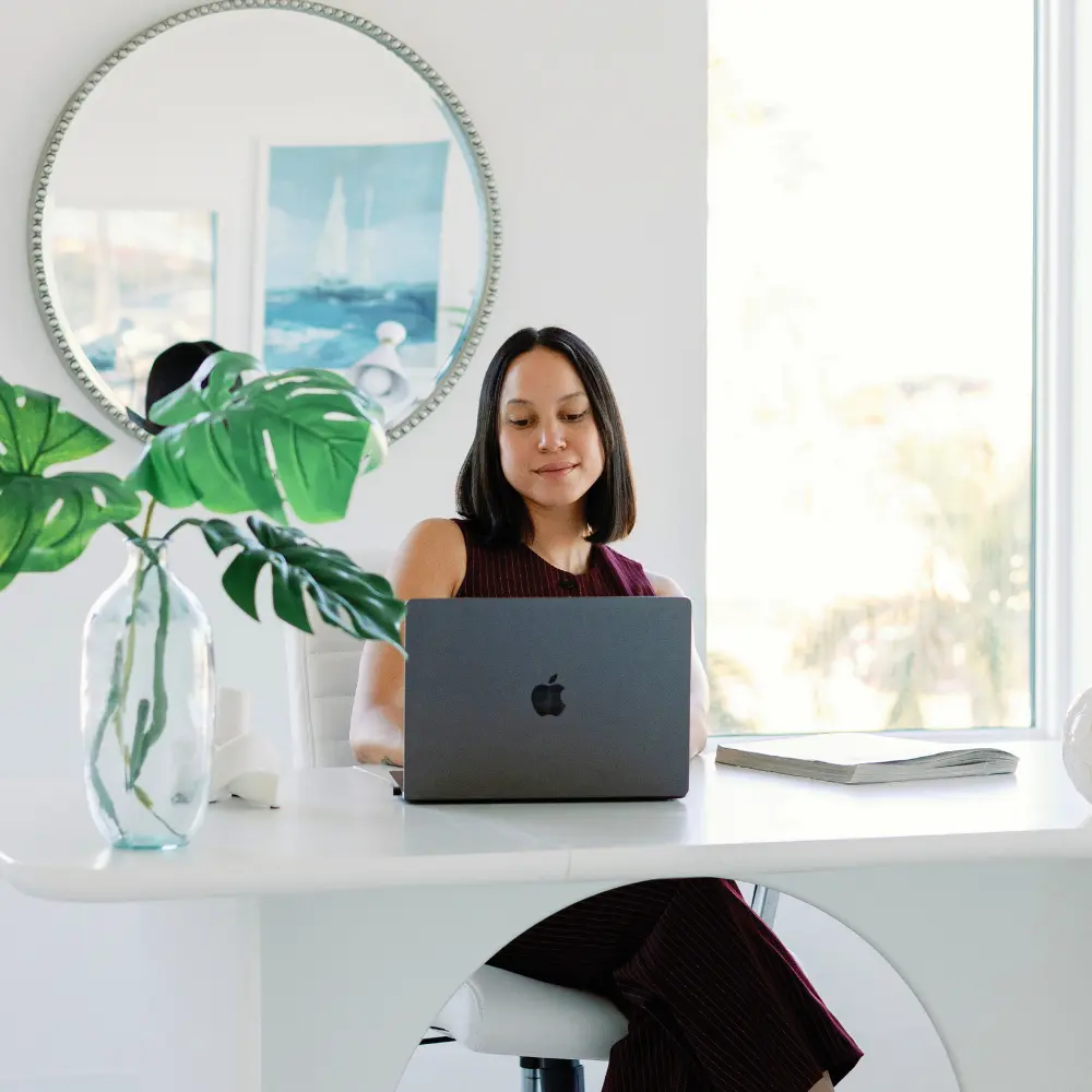 Kirby Drake, St. Petersburg real estate advisor, reviewing market data at her home office in Tampa Bay