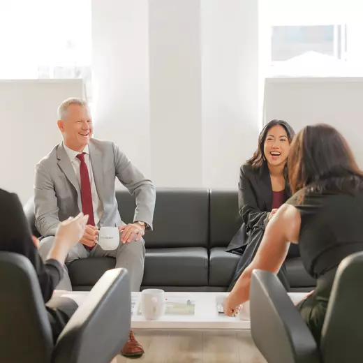 Home seller client sitting with an Engel & Völkers South Tampa advisor for a meeting. 