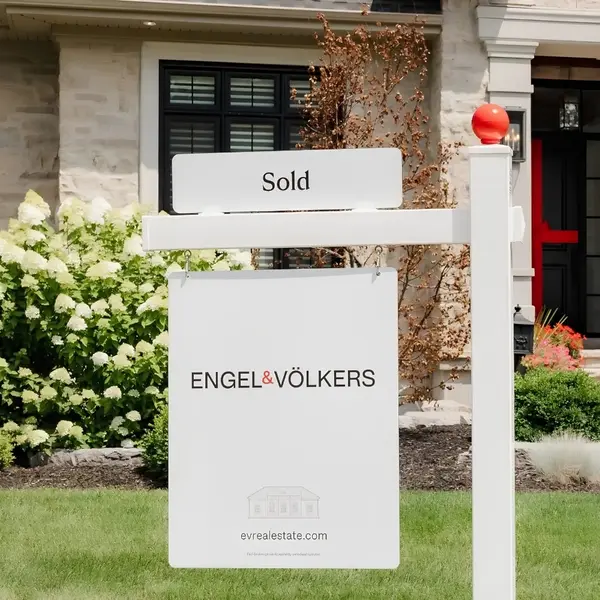 Engel and Völkers Sold sign in front of a luxury home sold by Kirby Drake real estate advisor Tampa Bay