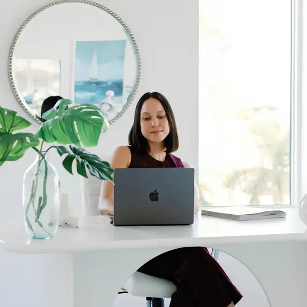 Kirby Drake, St. Petersburg real estate advisor, reviewing market data at her home office in Tampa Bay
