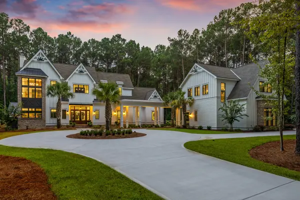 Lowcountry home at twilight with circular drive