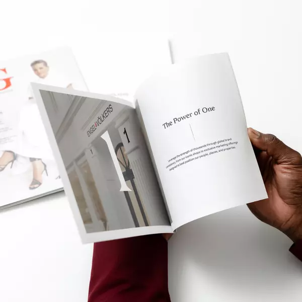 Engel & Volkers marketing booklet being flipped through