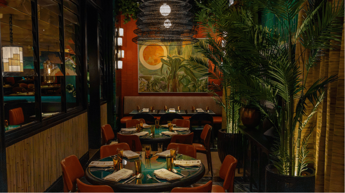 The neon soaked private dining area at Crying Tiger
