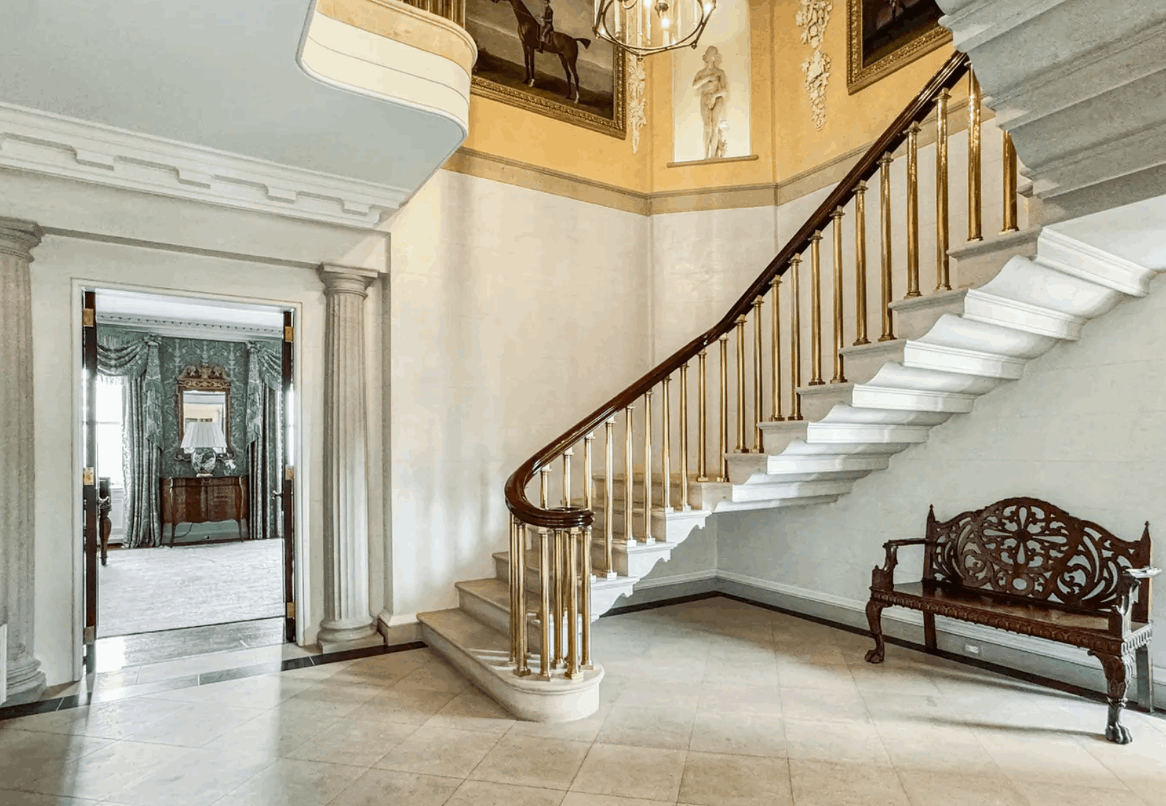 Classic pre-war co-op grand staircase interior at 1530 N State Parkway Chicago