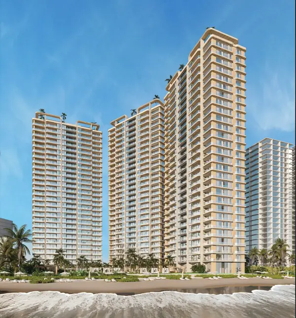 Tidenta Condominiums. View of three towers