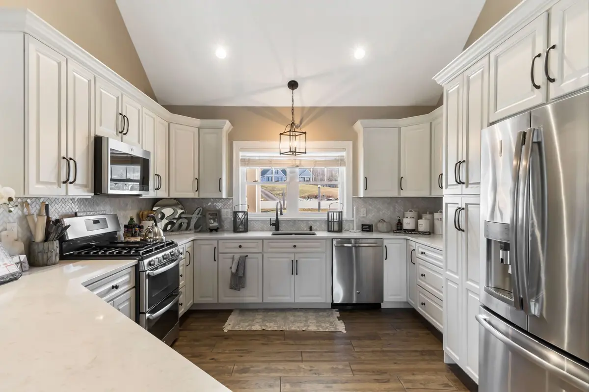 luxury-kitchen-with-white-cabinetry-and-chrome-app-2026-03-09-02-57-39-utc