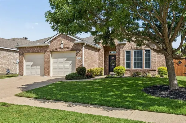 Curb Appeal & Charm Welcome you to 10418 Greenbriar Lane in Rowlett's Waterview Community