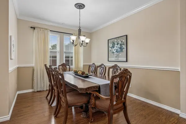 Light-filled formal dining room in Rowlett Waterview home