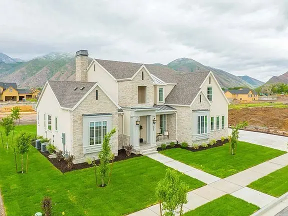 Should I Buy Land and Build Later, or Buy a Finished Home Now in Utah County?