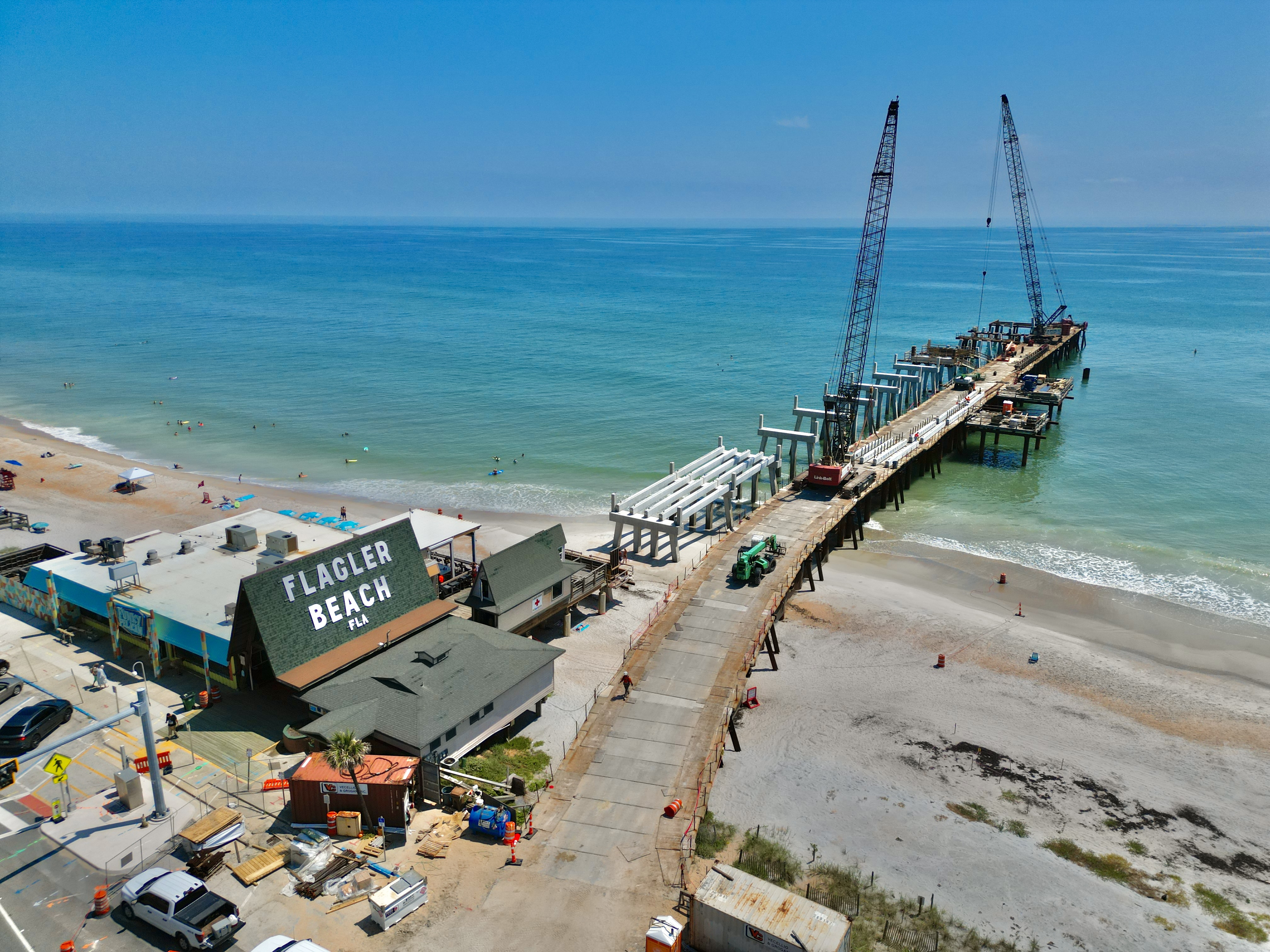 Flagler Beach pier reconstruction underway in 2026 showing new concrete structure extending into the Atlantic Ocean