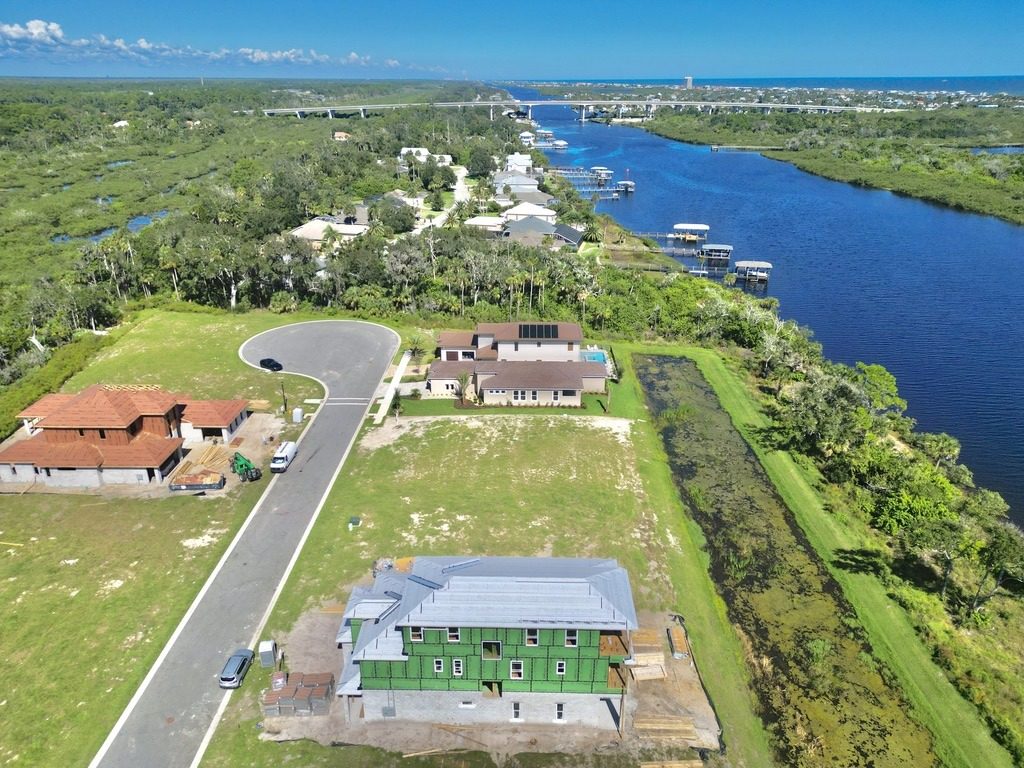 Infrastructure already in the ground at Veranda Bay, with retention ponds, marsh and the Intracoastal beyond. Photo: The Landmark Group at Compass.