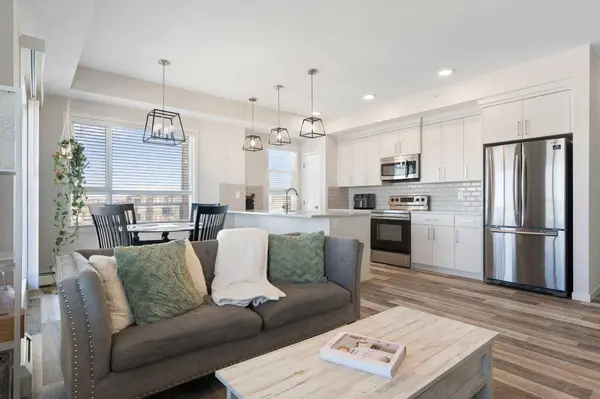 300 Harvest Hills PL NE #402, Calgary, AB T3K 2P4