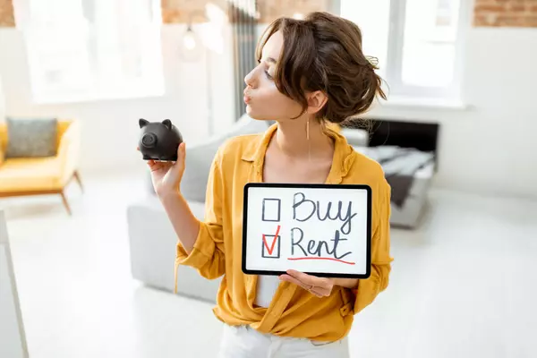 woman-decides-between-buying-or-renting-house-2025-03-16-03-24-39-utc