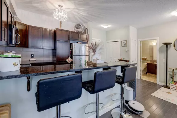 48 Panatella RD NW #103, Calgary, AB T3R 0V4