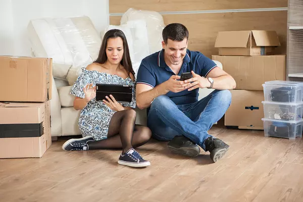 happy-couple-moving-to-a-new-home-2022-10-11-18-39-57-utc