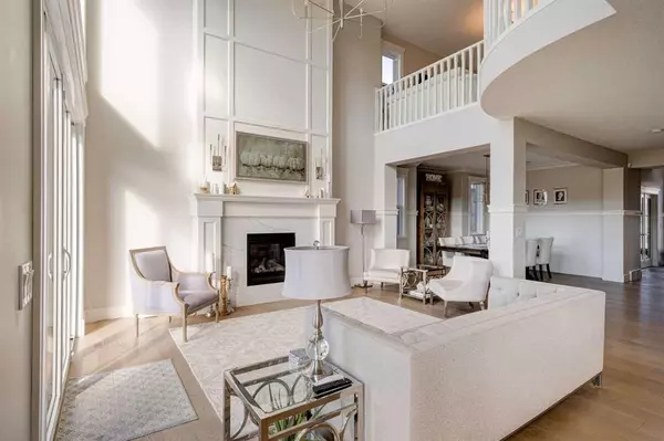 feature image of 147 Legacy Mount SE — Luxury Living Backing the Ridge