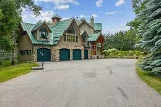 Friday Featured Home: A Rustic Masterpiece in Woodlands Estates