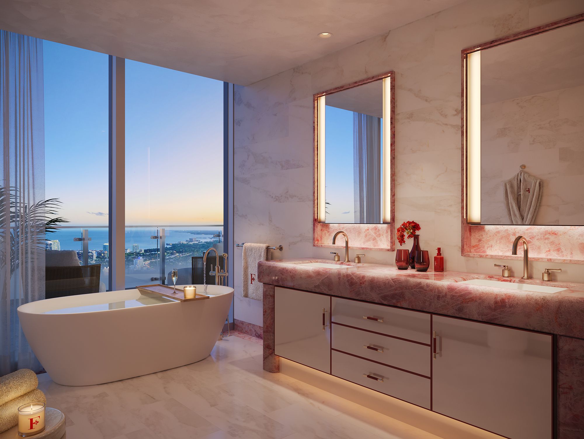 Primary bedroom suite with waterfront views at Faena Residences Miami luxury residences