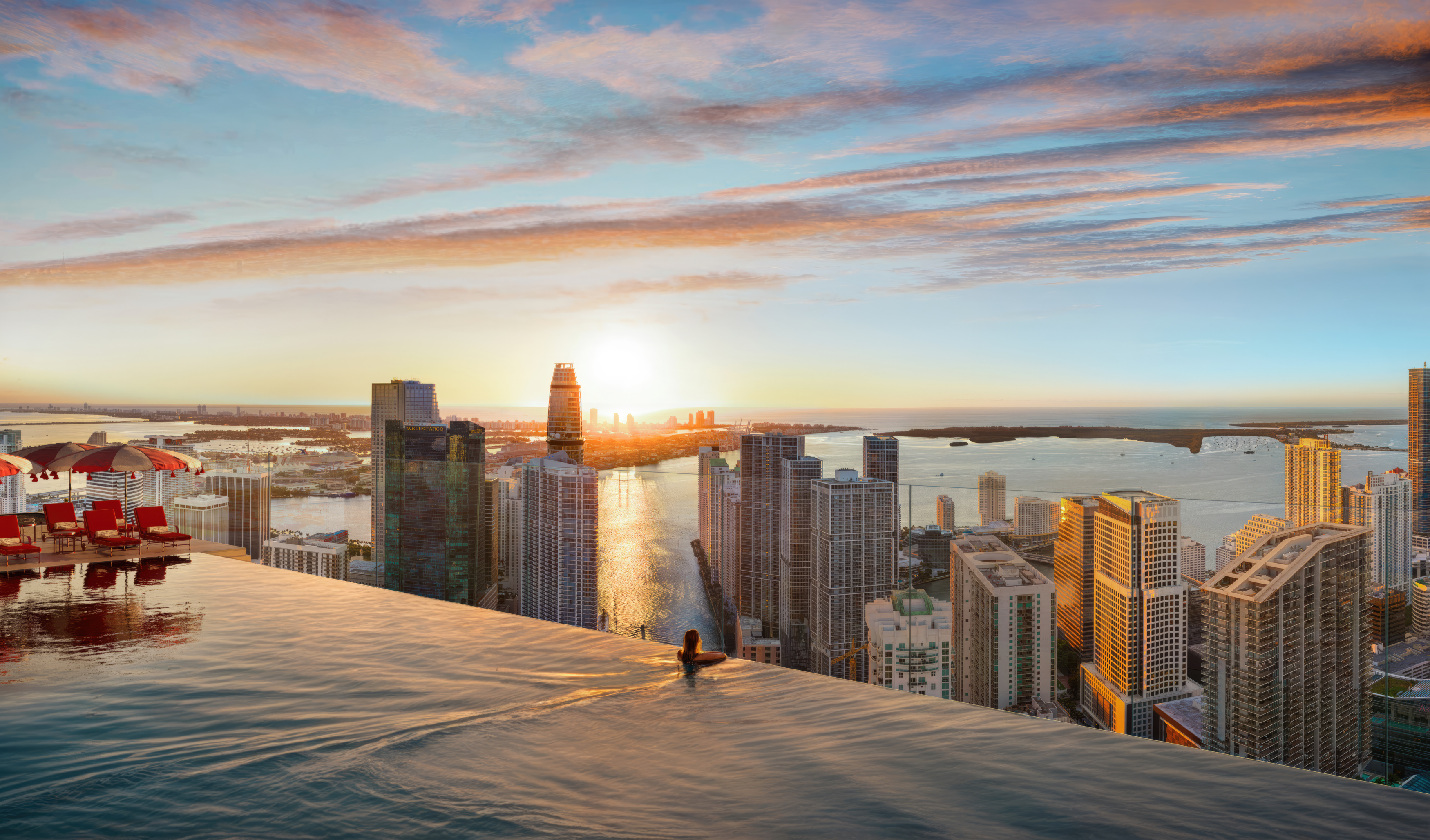 Rooftop pool deck and luxury outdoor lounge at Faena Residences Miami waterfront tower
