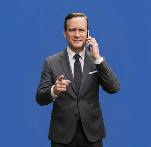 Nathan on the phone pointing at you