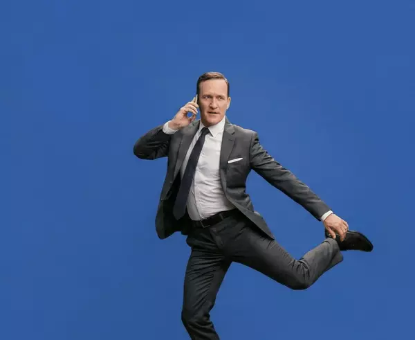 Nathan on the phone dancing