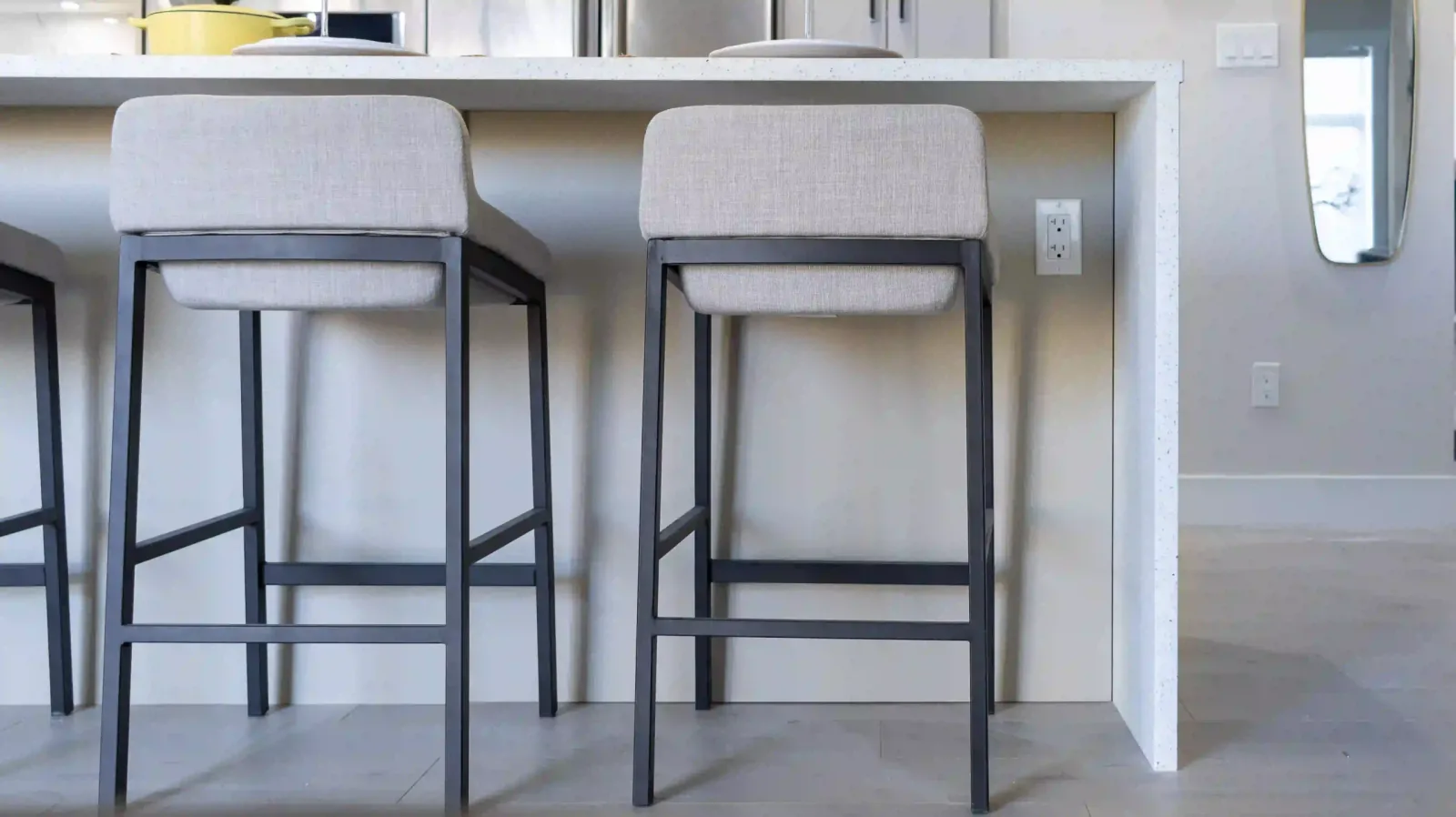Kitchen island with a waterfall counter in a Liberty Encore display home