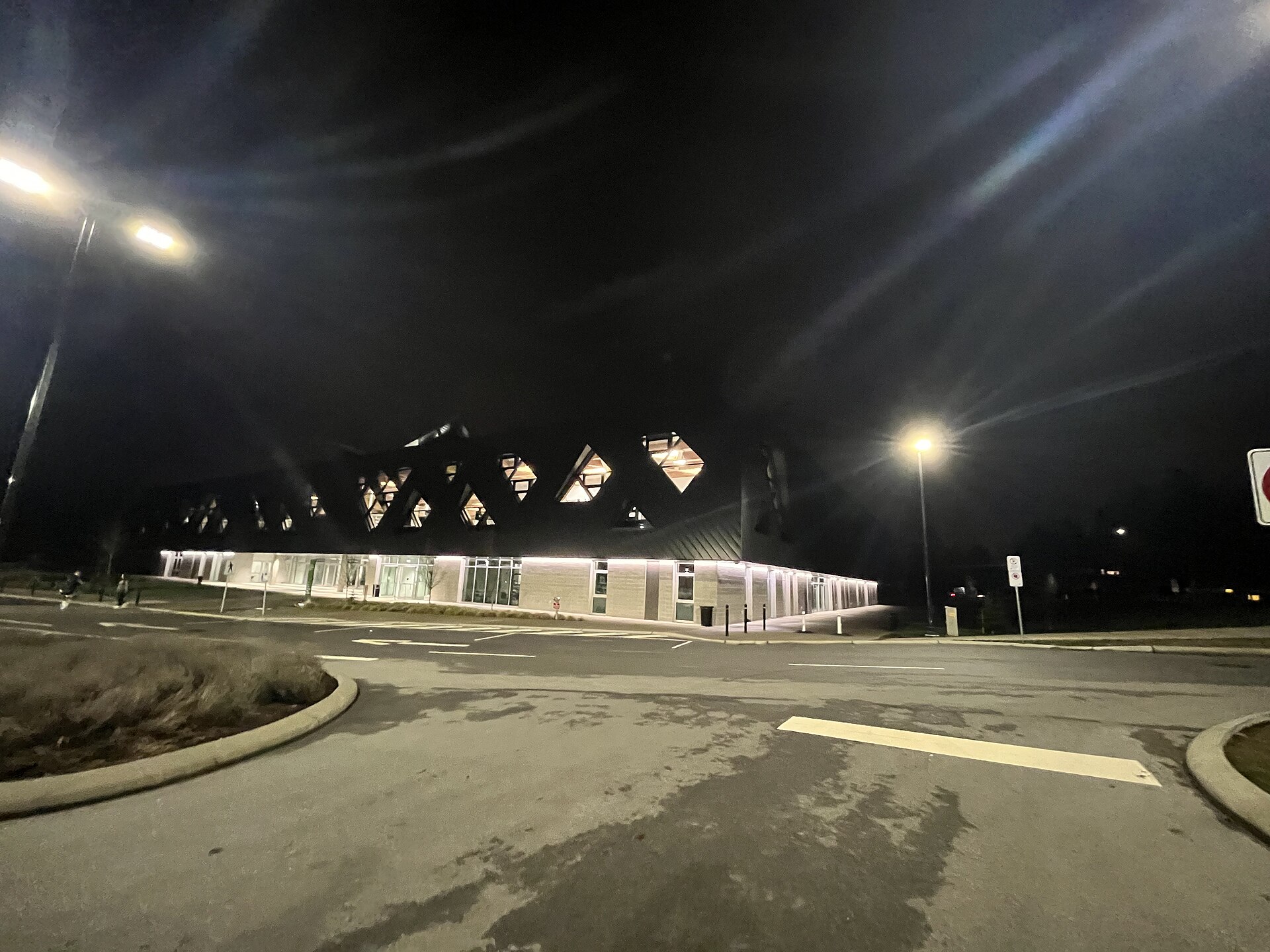 Clayton Community Centre exterior lit at night, a recent civic landmark serving Clayton Heights families